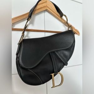 CHRISTIAN DIOR PARIS black leather, saddle bag with gold embellishments